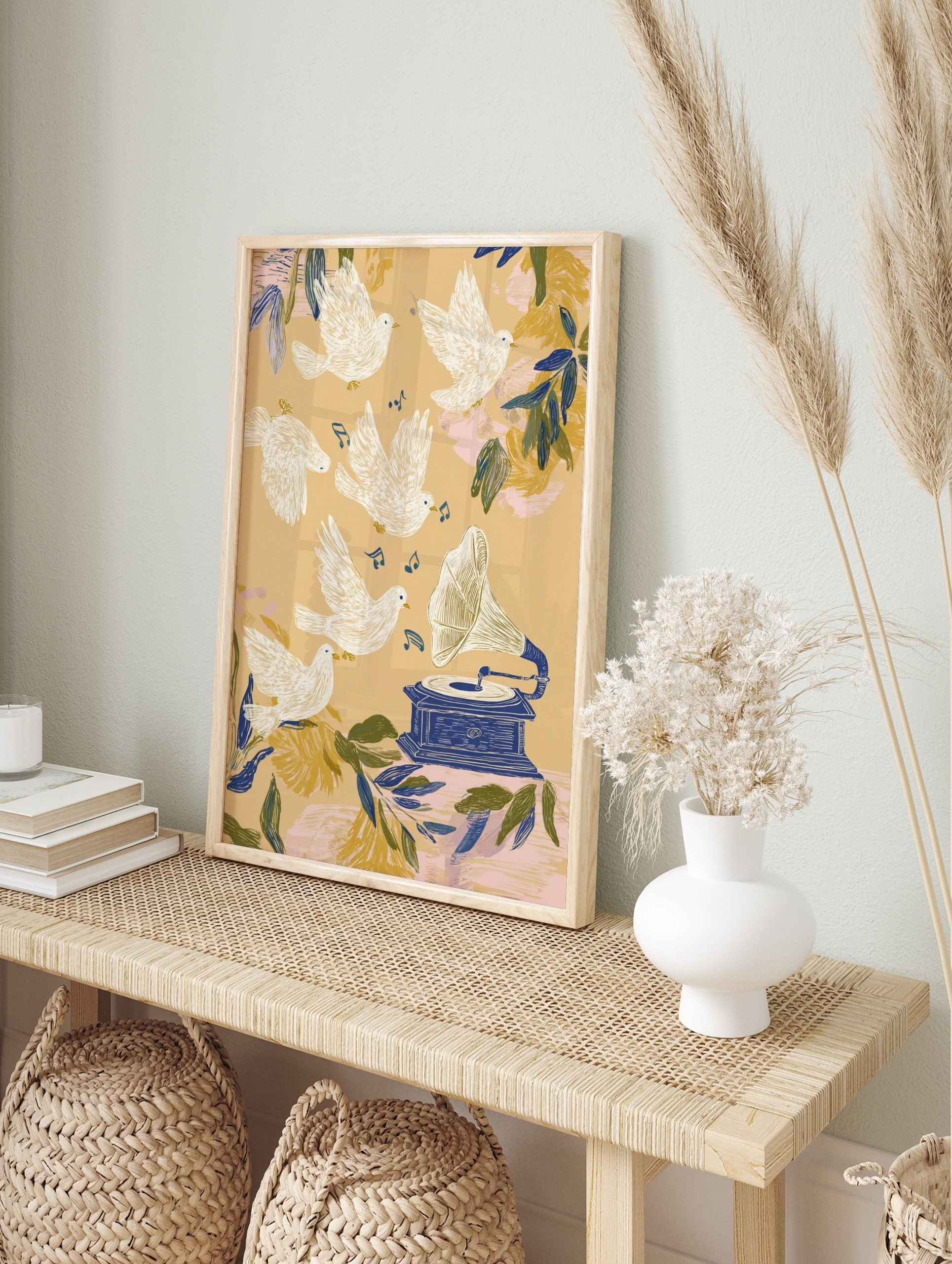 Illustrative art print with white doves flying around a blue gramophone and music notes on a, in an alternate framed mockup