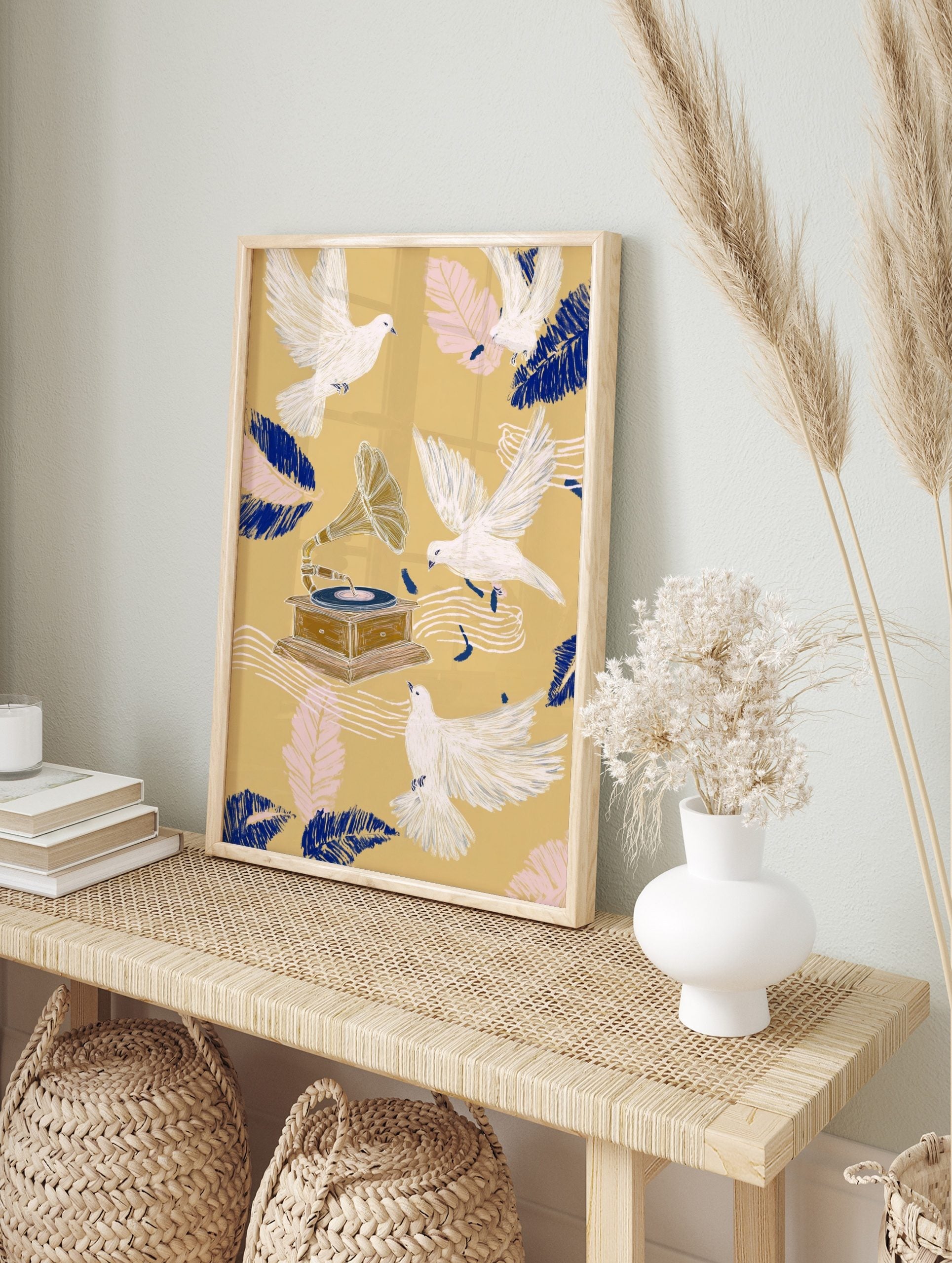 Illustrative art print with white doves flying around a vintage gramophone, blue and pink, in an alternate framed mockup