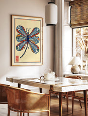 Stylized multi-color dragonfly illustration art print with blue, orange, and red wings on a light yellow background and a red seal. - Image 2