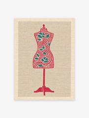 Stylized red and teal dress form wall art print on a textured beige background, featuring stripes and leaf motifs.