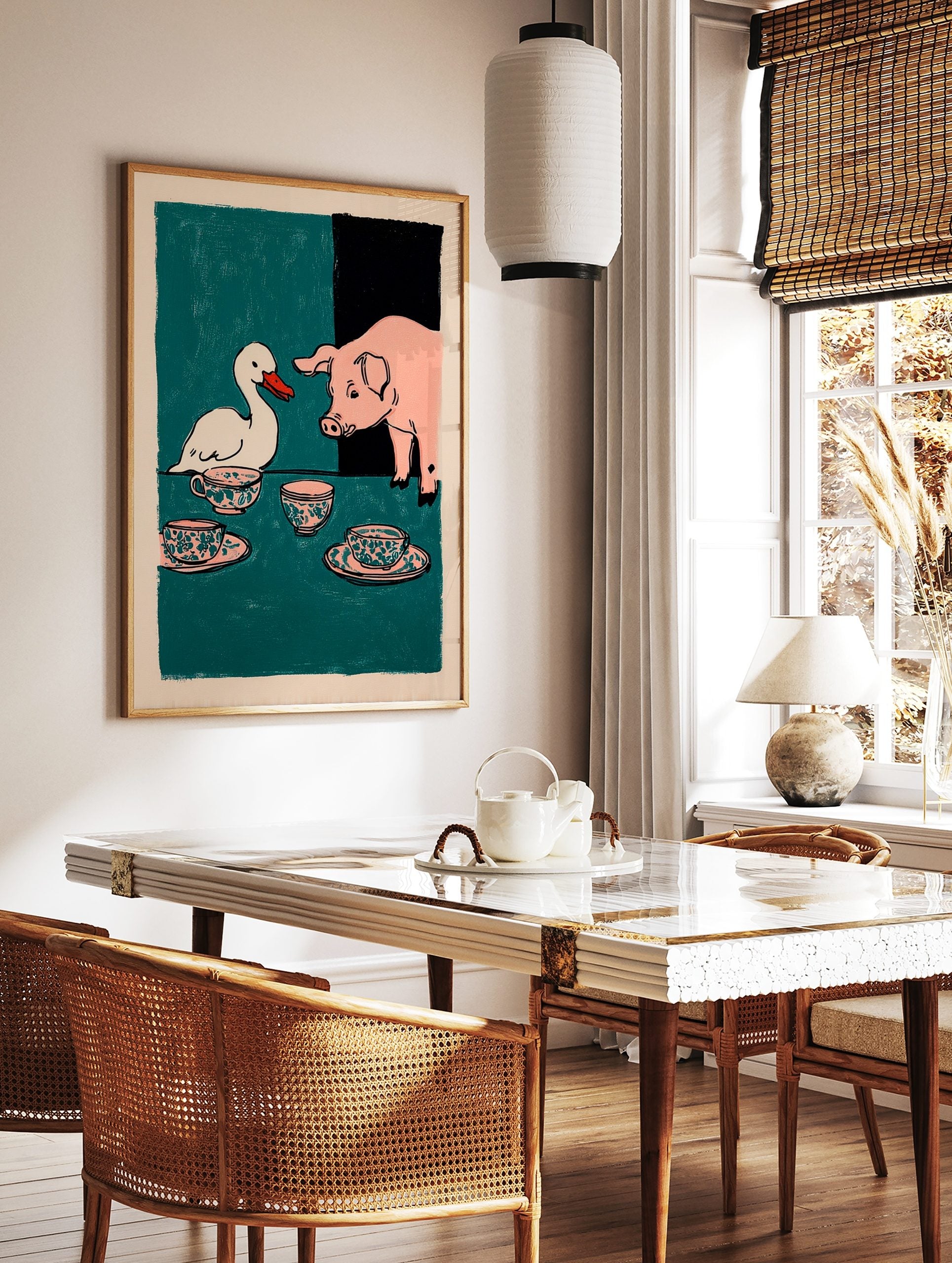 Illustrative print of a white duck and a pink pig at a tea party with patterned teacups on a teal, in a styled room mockup