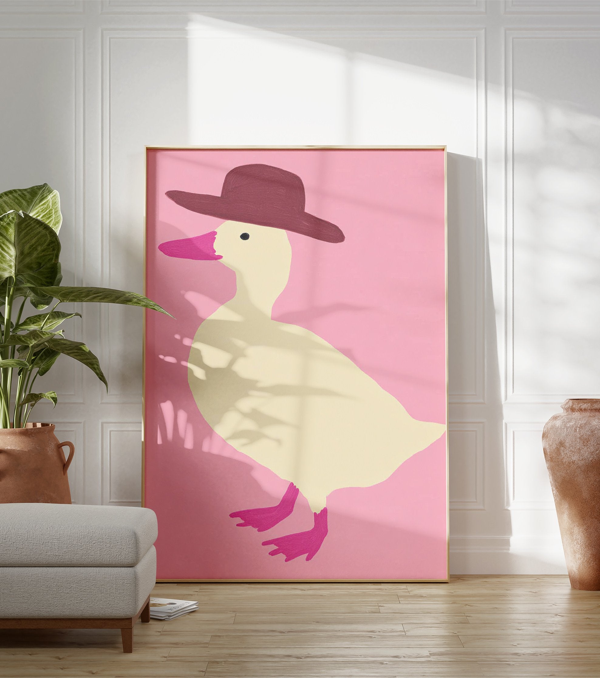 Illustration of a cream duck wearing a brown hat against a pink background, with pink beak and feet. - Image 3