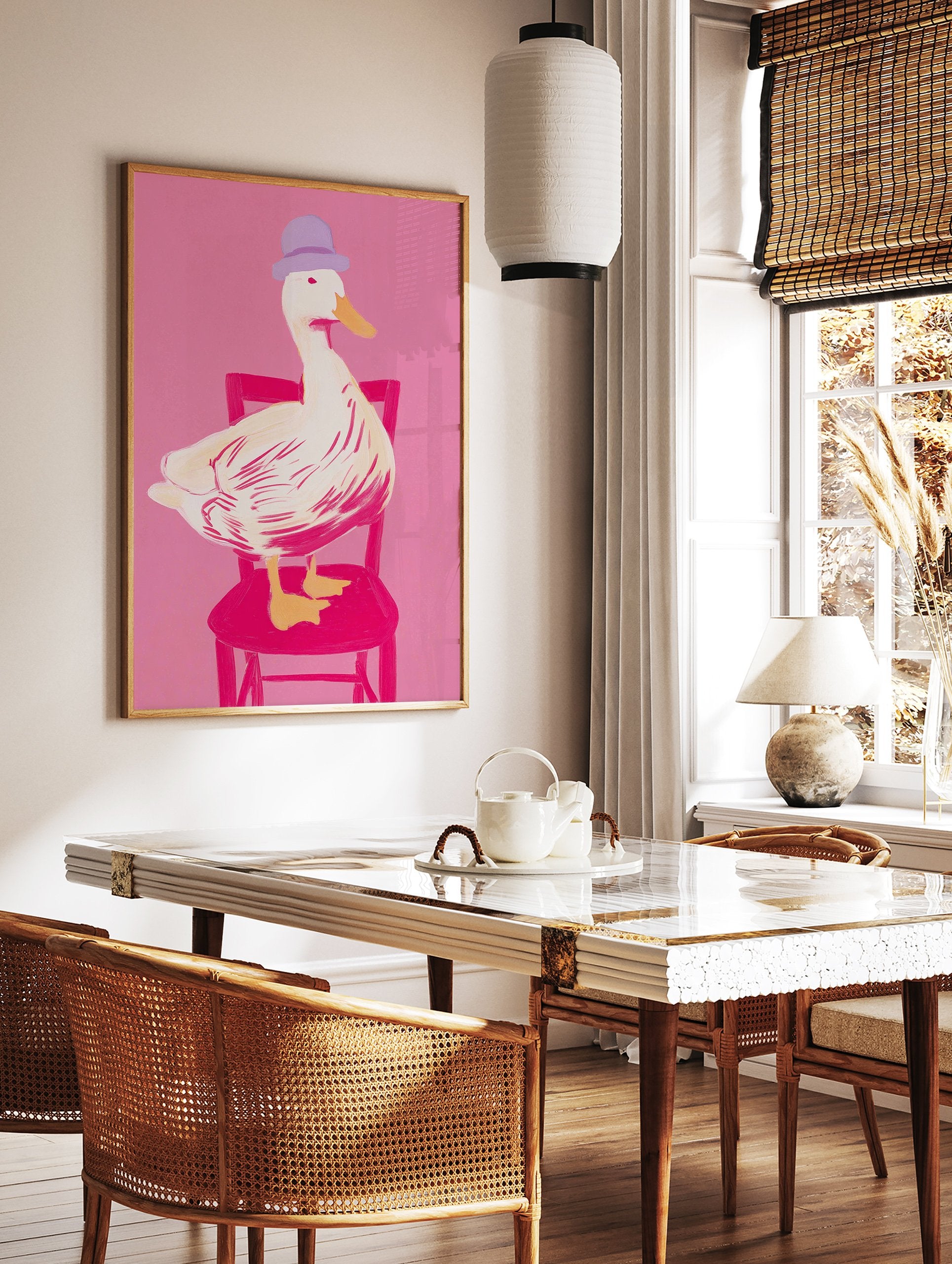 Whimsical duck art print with a white duck in a purple hat sitting on a pink chair against a bright pink background - Image 2