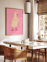 Illustrated duck wall art with crossed arms on a pink background, featuring a pale yellow duck with a reddish-pink beak. - Image 2