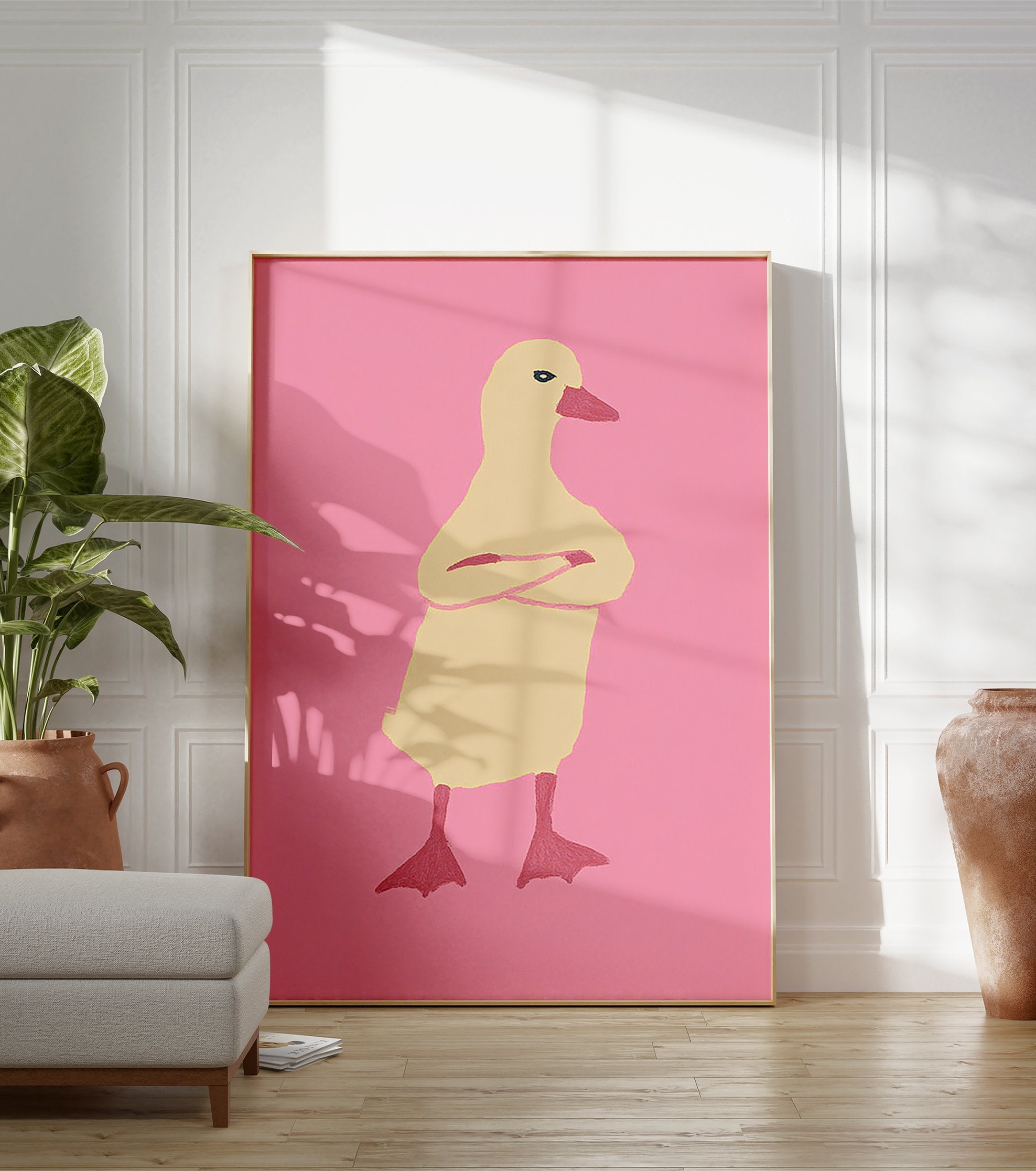 Illustrated duck wall art with crossed arms on a pink background, featuring a pale yellow duck with a reddish-pink beak. - Image 3