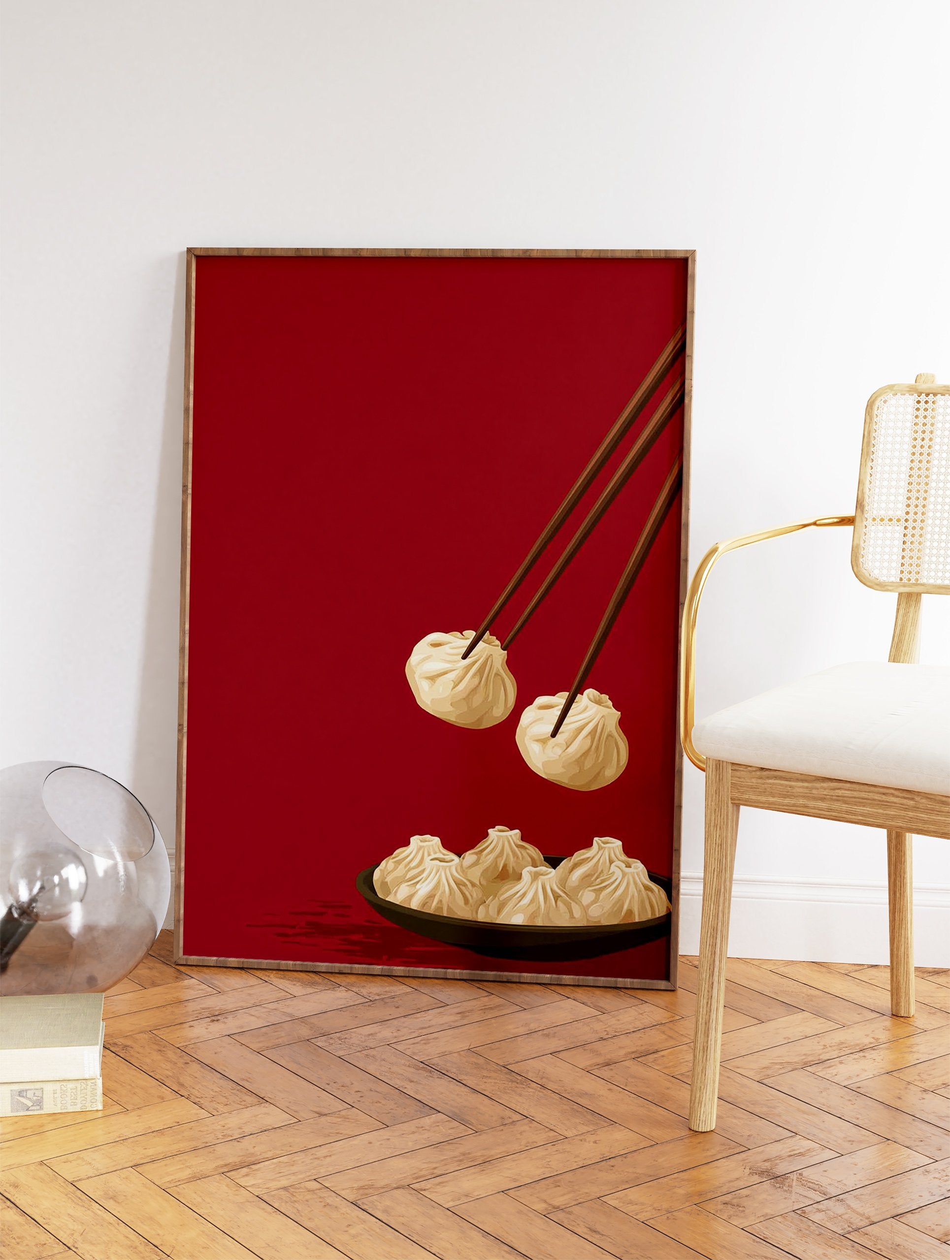 Illustrated dumpling wall art showing chopsticks picking up a dumpling from a bowl on a deep red background. - Image 2