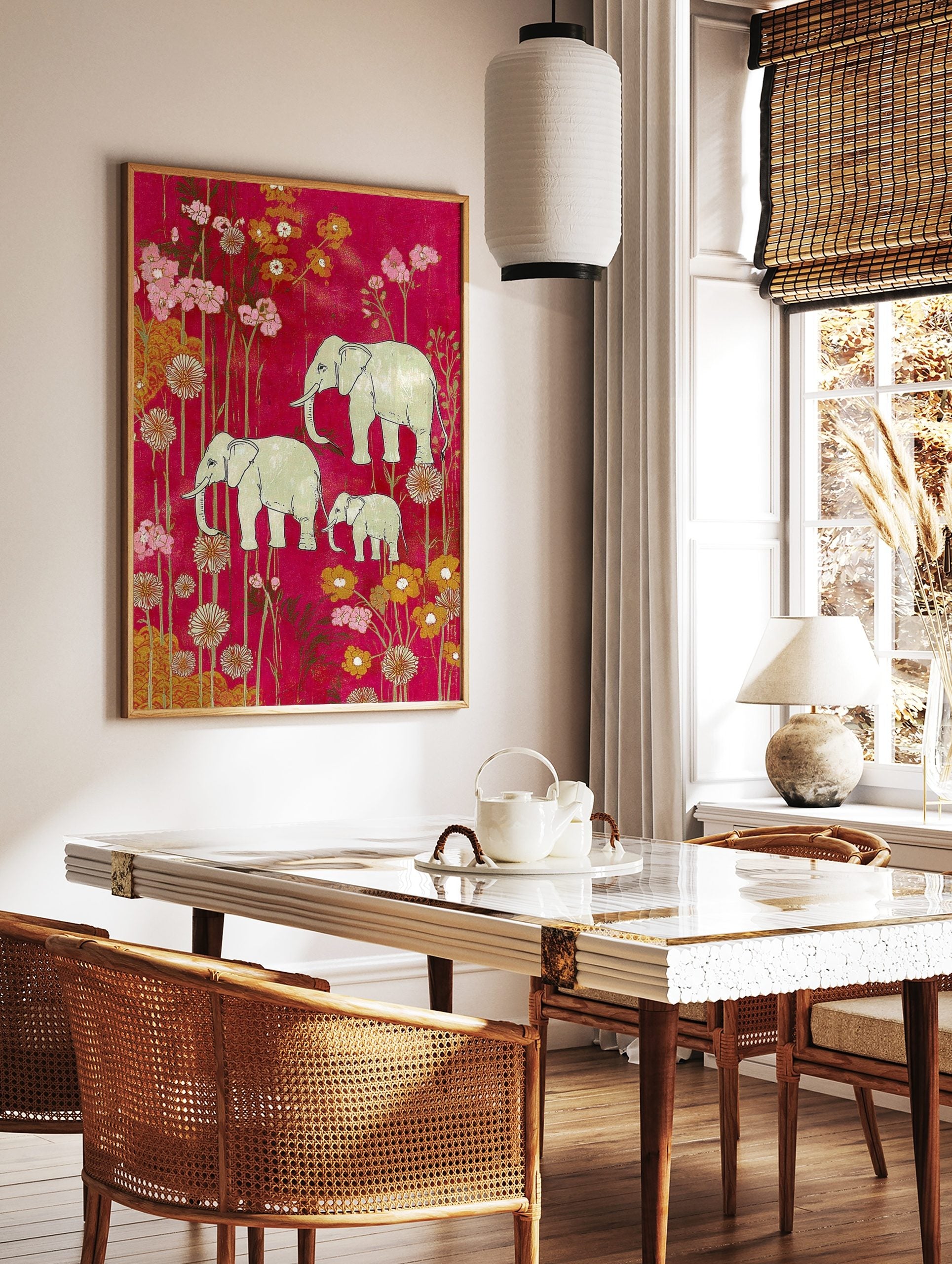 Illustrative elephant family (two adults, one calf) amidst pink and gold flowers on a magenta, in a styled room mockup