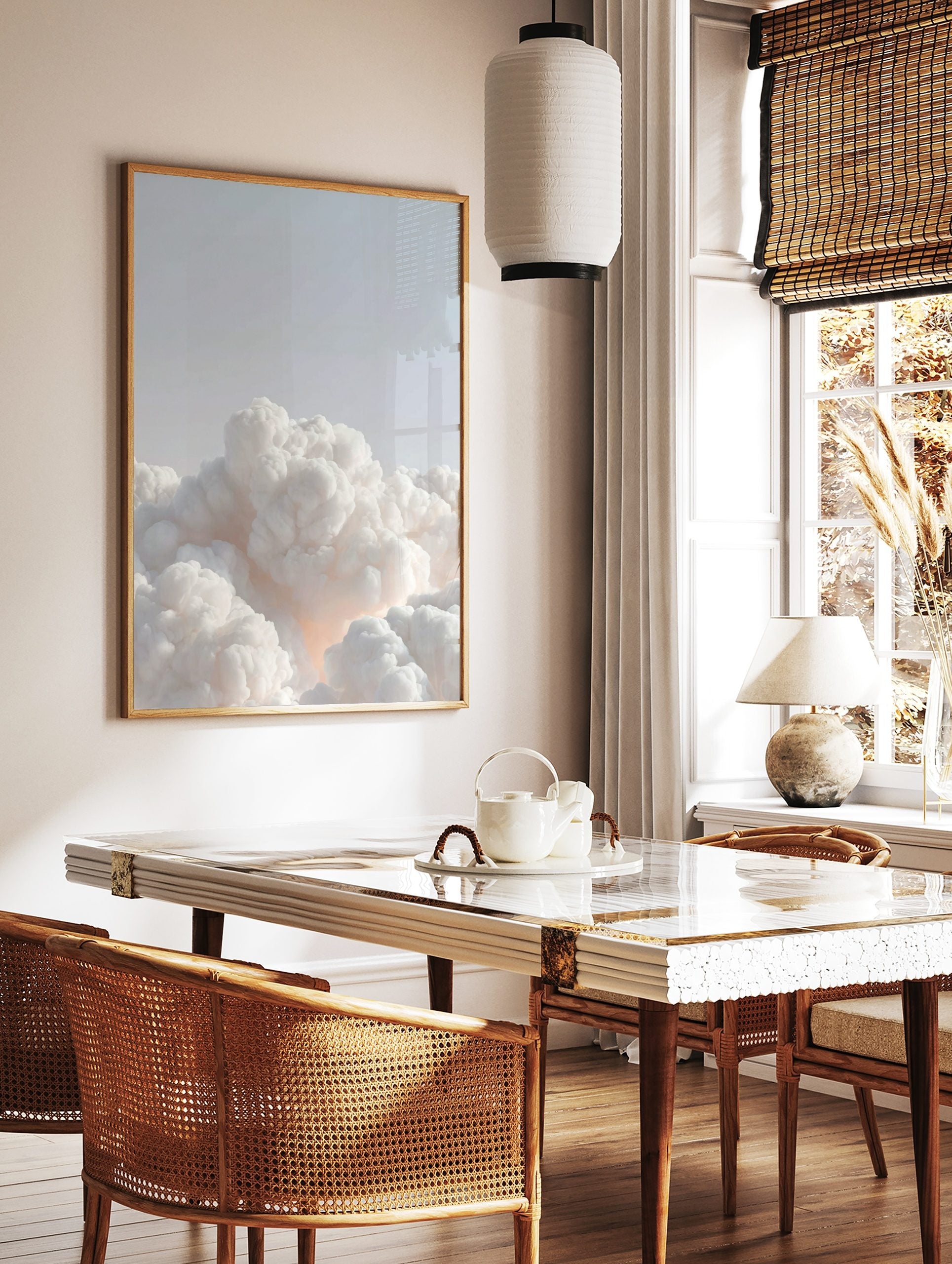 Ethereal white voluminous clouds against a pale blue sky with a soft warm glow, minimalist, in a styled room mockup