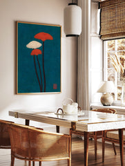 Illustrative wall art of three fanned mushroom plants with orange and white caps against a deep, in a styled room mockup