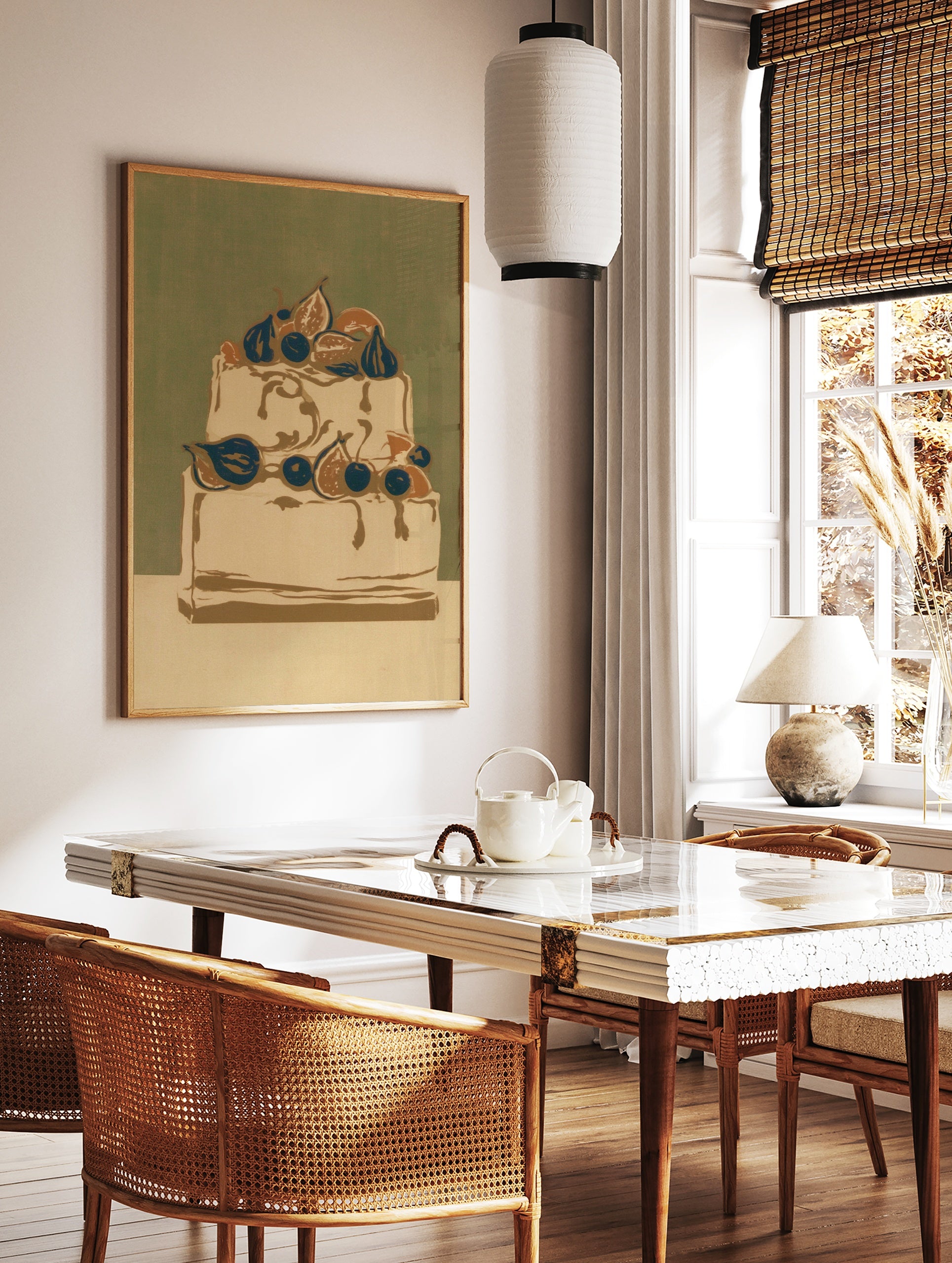 Illustrative wall art print of a two-tiered cake decorated with figs and blueberries against a, in a styled room mockup