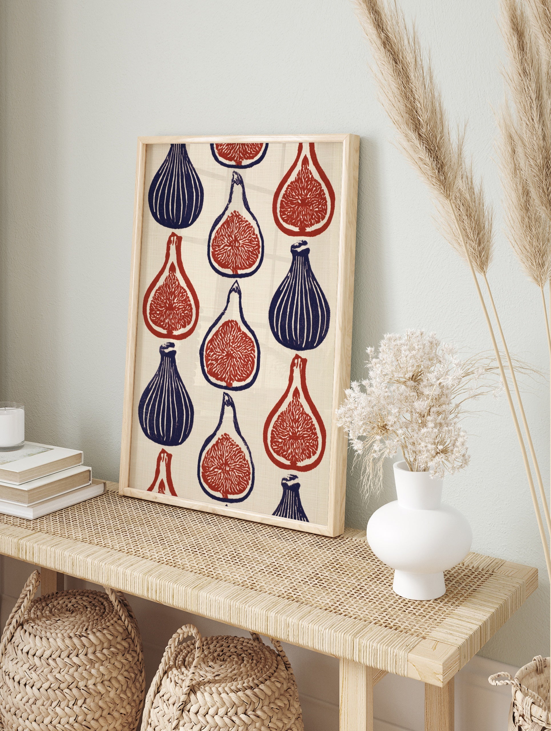 Botanical fig wall art print featuring a repeating pattern of whole and sliced figs in deep, in an alternate framed mockup