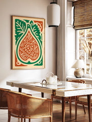 Illustrative fig botanical print, cut in half with seeds, green leaves, and reddish-orange flesh on, in a styled room mockup