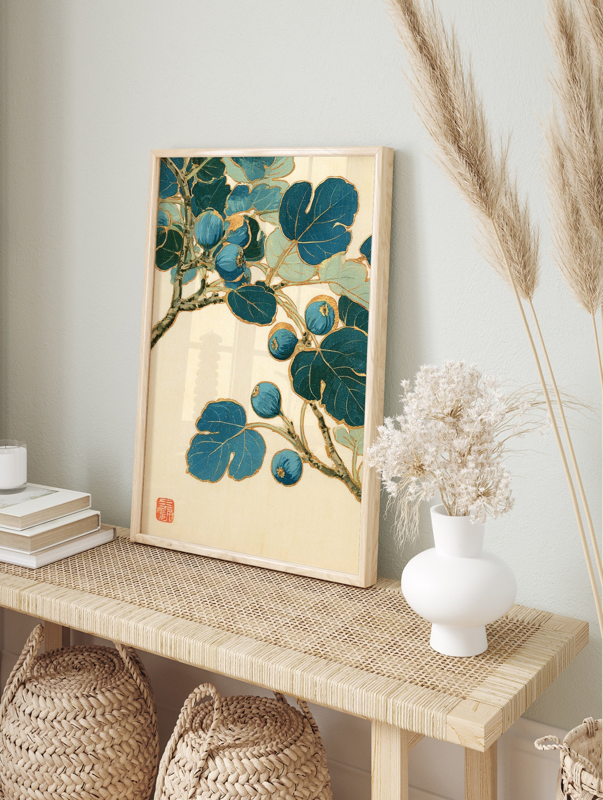 Japanese-style botanical illustration of a blue fig branch with gold outlines on an off-white, in an alternate framed mockup