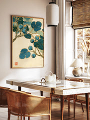 Japanese-style botanical illustration of a blue fig branch with gold outlines on an off-white, in a styled room mockup