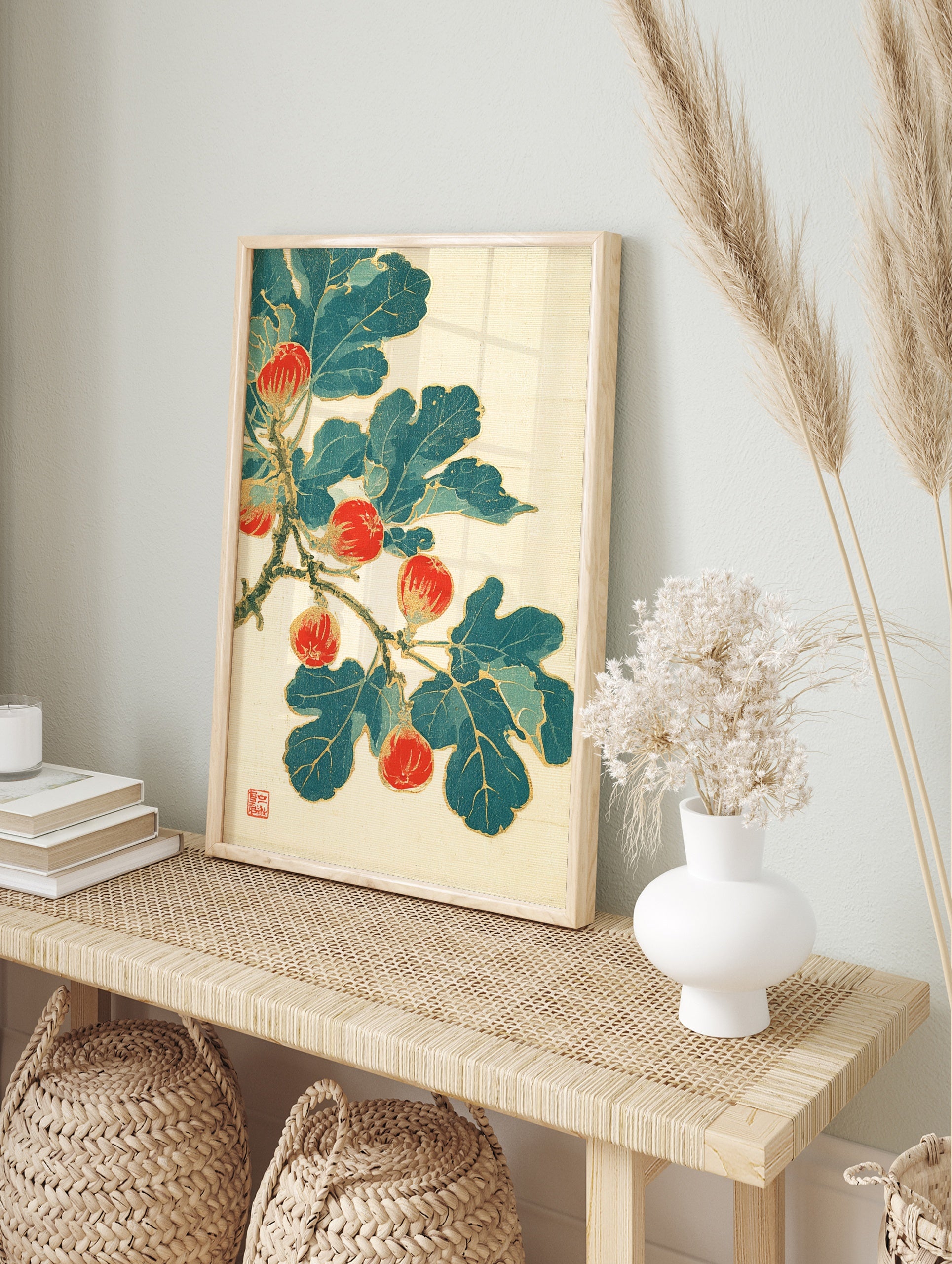 Japanese style botanical fig fruit branch illustration with red figs and green leaves on a, in an alternate framed mockup