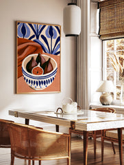 Still life art print of figs in a blue and white patterned bowl with terracotta fabric and blue, in a styled room mockup