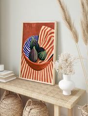 Still life art print of three purple figs in a blue and white striped bowl against a red and, in an alternate framed mockup