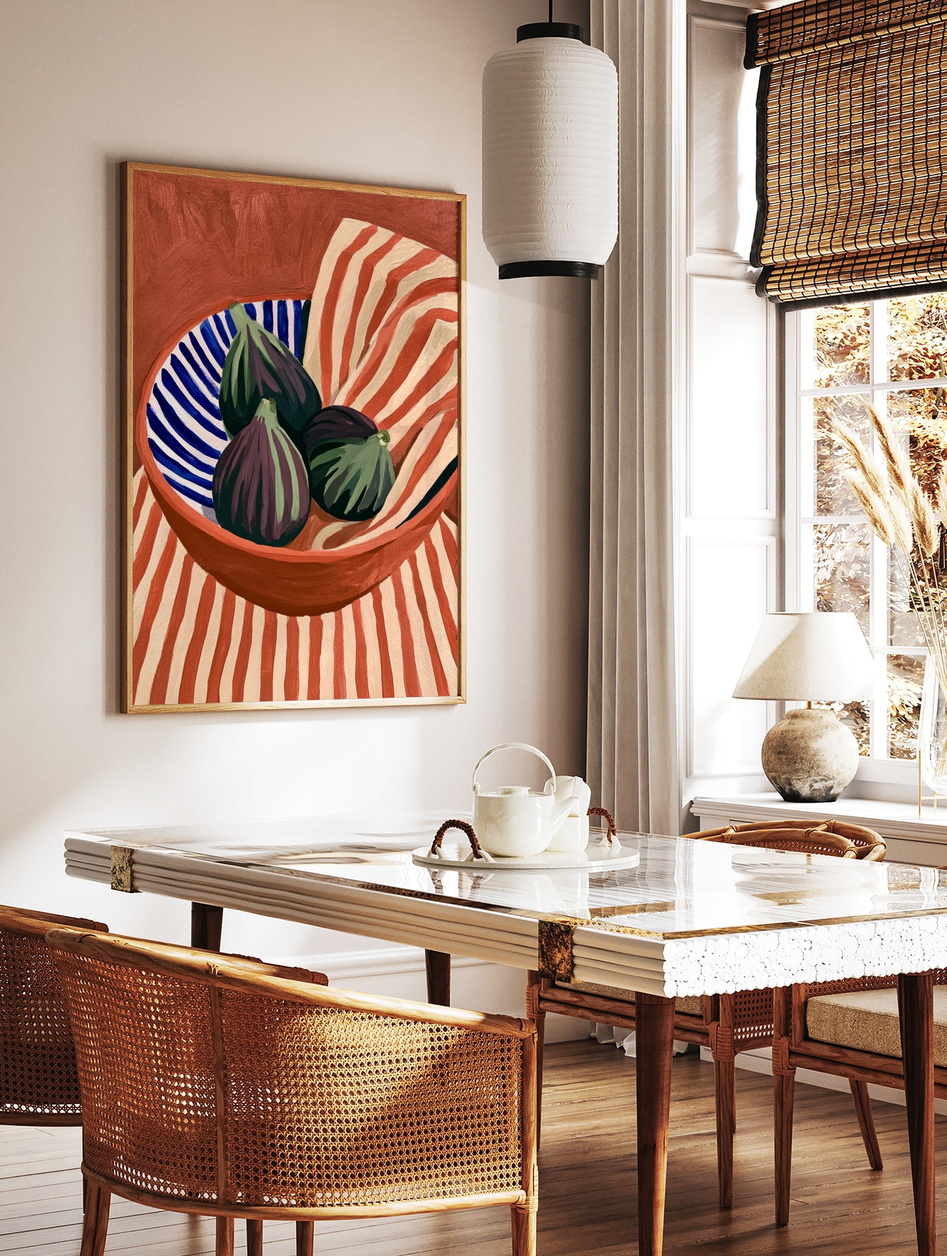 Still life art print of three purple figs in a blue and white striped bowl against a red and beige, in a styled room mockup
