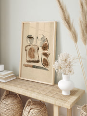 Illustrative breakfast art print featuring a slice of fig toast, fresh figs, and condiments, in an alternate framed mockup