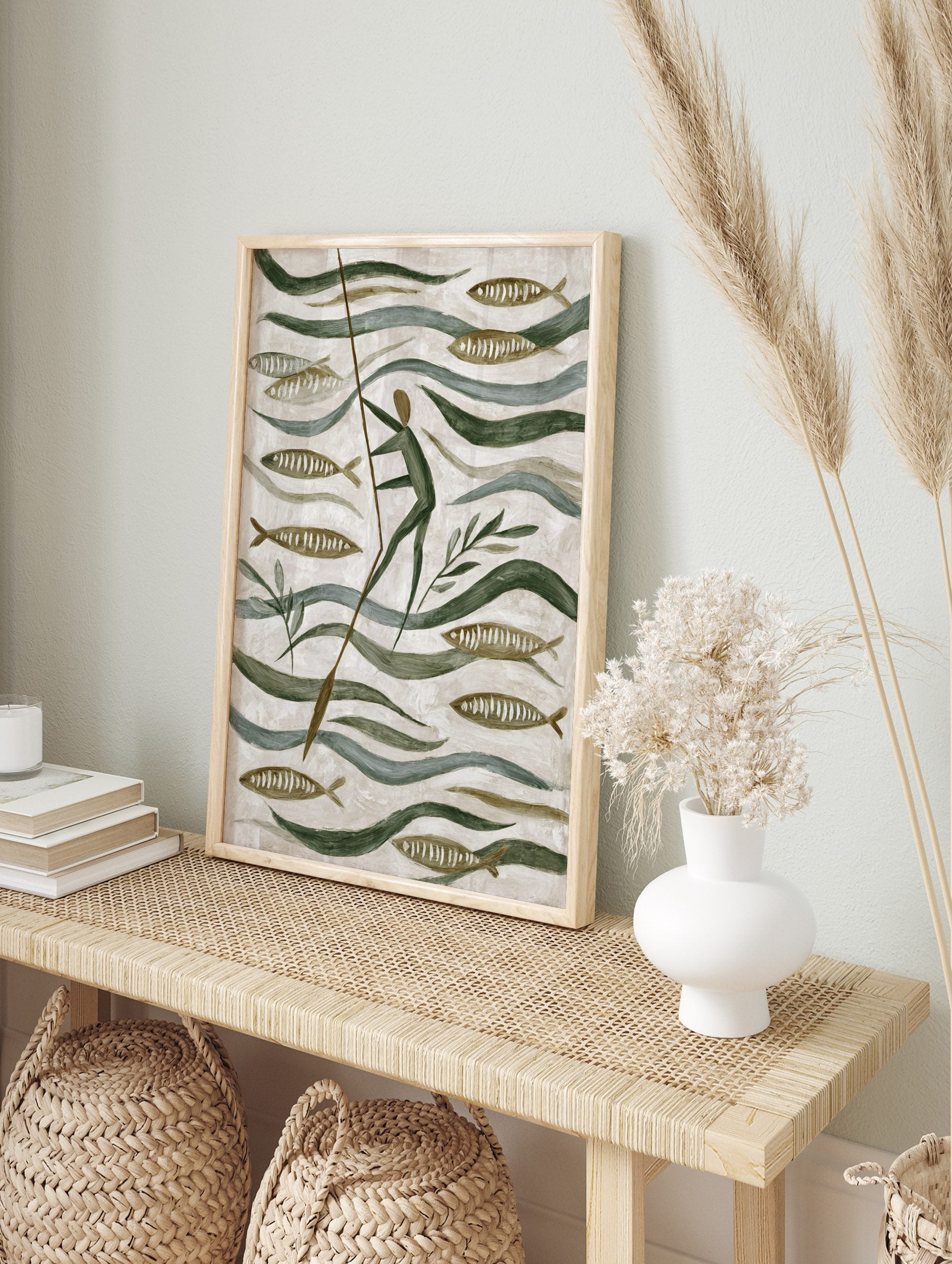 Stylised folk art painting of a person poling through water with fish and green plants in, in an alternate framed mockup