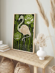 Illustrative flamingo bird art print in water with green water lilies and reeds, white, in an alternate framed mockup