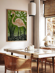 Linocut style art print of a flamingo standing in green water with reeds and white tropical foliage, in a styled room mockup