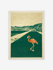 Flamingo walking on a path in a tropical landscape art print with green, gold, and orange colors in a block print style.