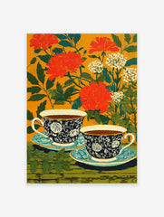 Floral tea cup poster with two dark blue patterned cups and saucers against an orange background with red flowers and green leaves.