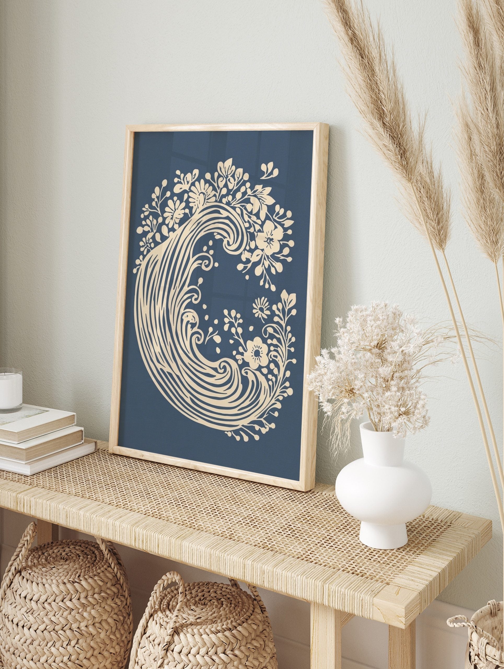 Cream floral wave botanical art print on a deep blue background, unframed, in an alternate framed mockup