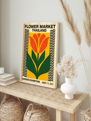 Flower Market Thailand poster with a vintage illustration of an orange flower and green leaves on a yellow background with zig-zag borders. - Image 4