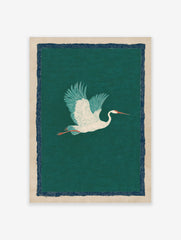 White crane bird with teal wings flying against a deep green wave-patterned background, with a navy border