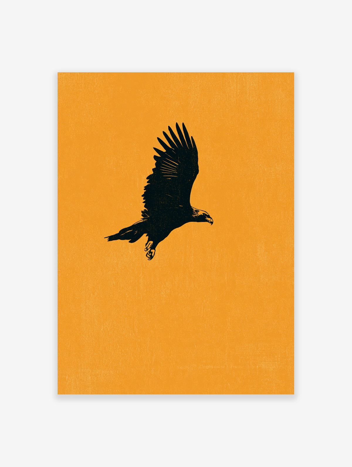 Black eagle silhouette in flight against a mustard yellow background, bird of prey wall art print