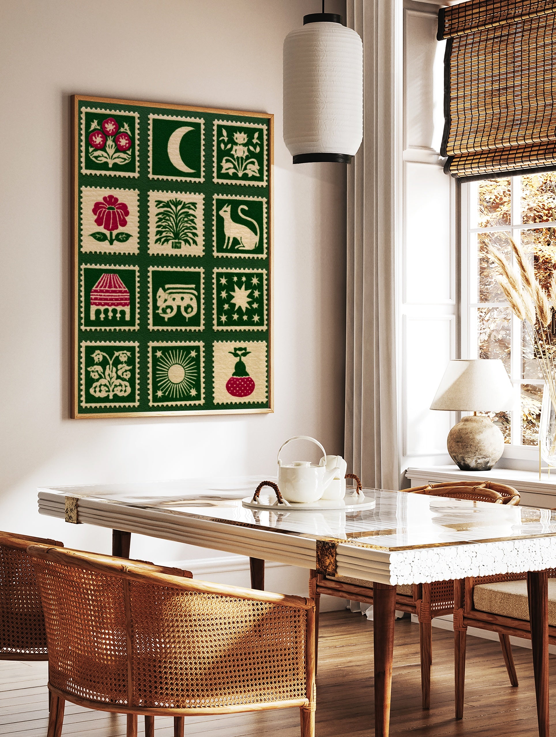Folk art style stamp grid print featuring botanical flowers, celestial moons, and animals on a deep, in a styled room mockup