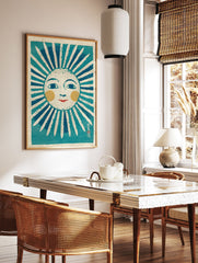 Stylized folk art sun print illustration with a smiling face, blue rays, yellow cheeks, and red lips on textured paper. - Image 2