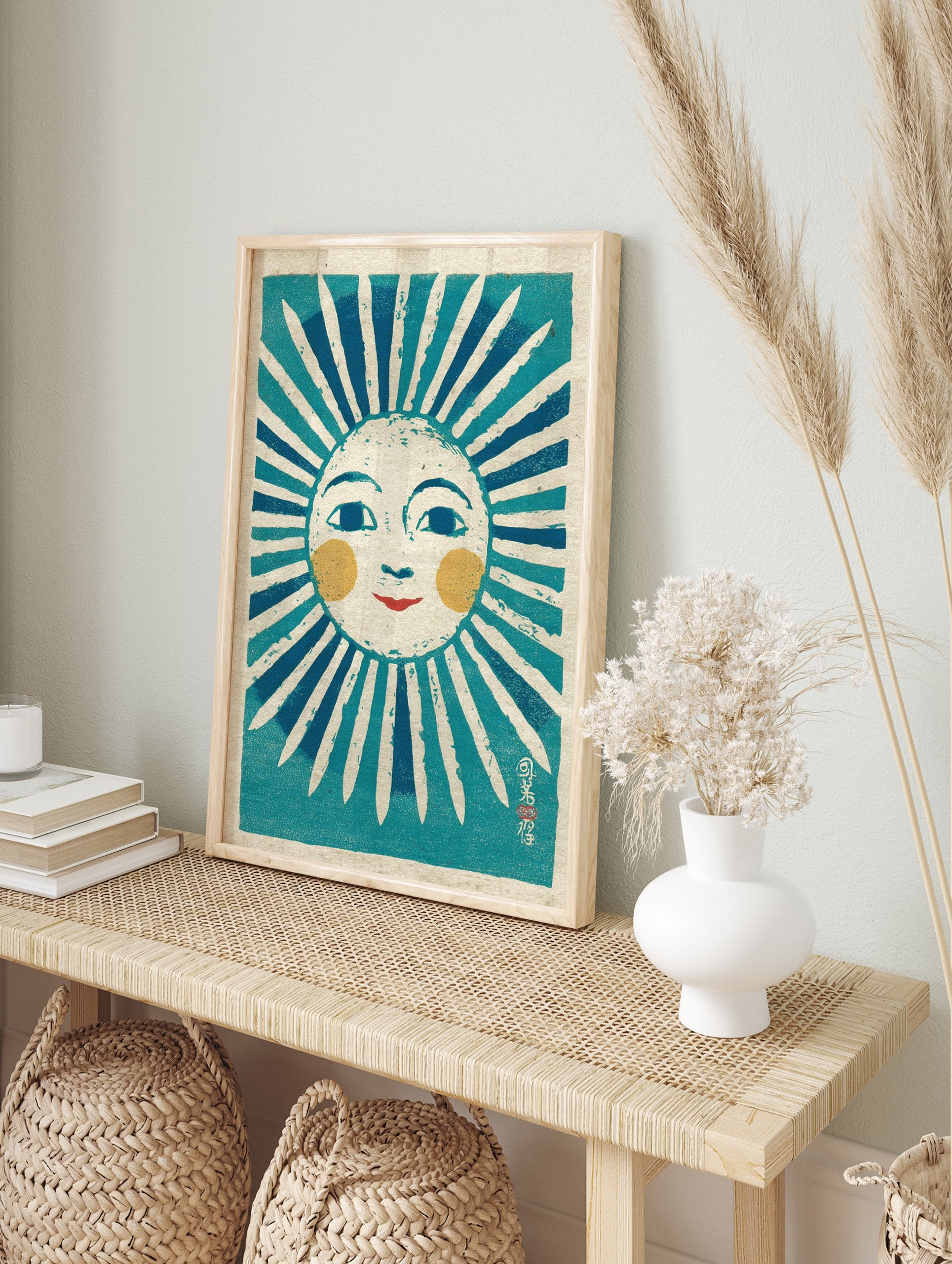 Stylized folk art sun print illustration with a smiling face, blue rays, yellow cheeks, and red lips on textured paper. - Image 3