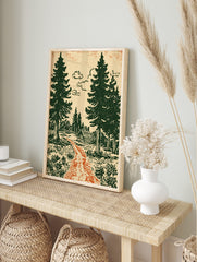 Illustrative forest scene with a log cabin, green pine trees, orange path, and cream sky, in an alternate framed mockup