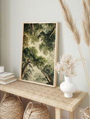 Forest canopy poster looking up through lush green trees and brown trunks against a light sky. - Image 4