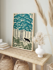 Woodcut style forest print with a black fox, large teal tree canopy, tree trunks, ferns, and, in an alternate framed mockup
