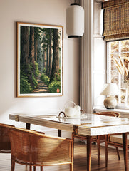 Forest path wall art with a distant torii gate, towering trees, and ferns in an illustrative, in a styled room mockup