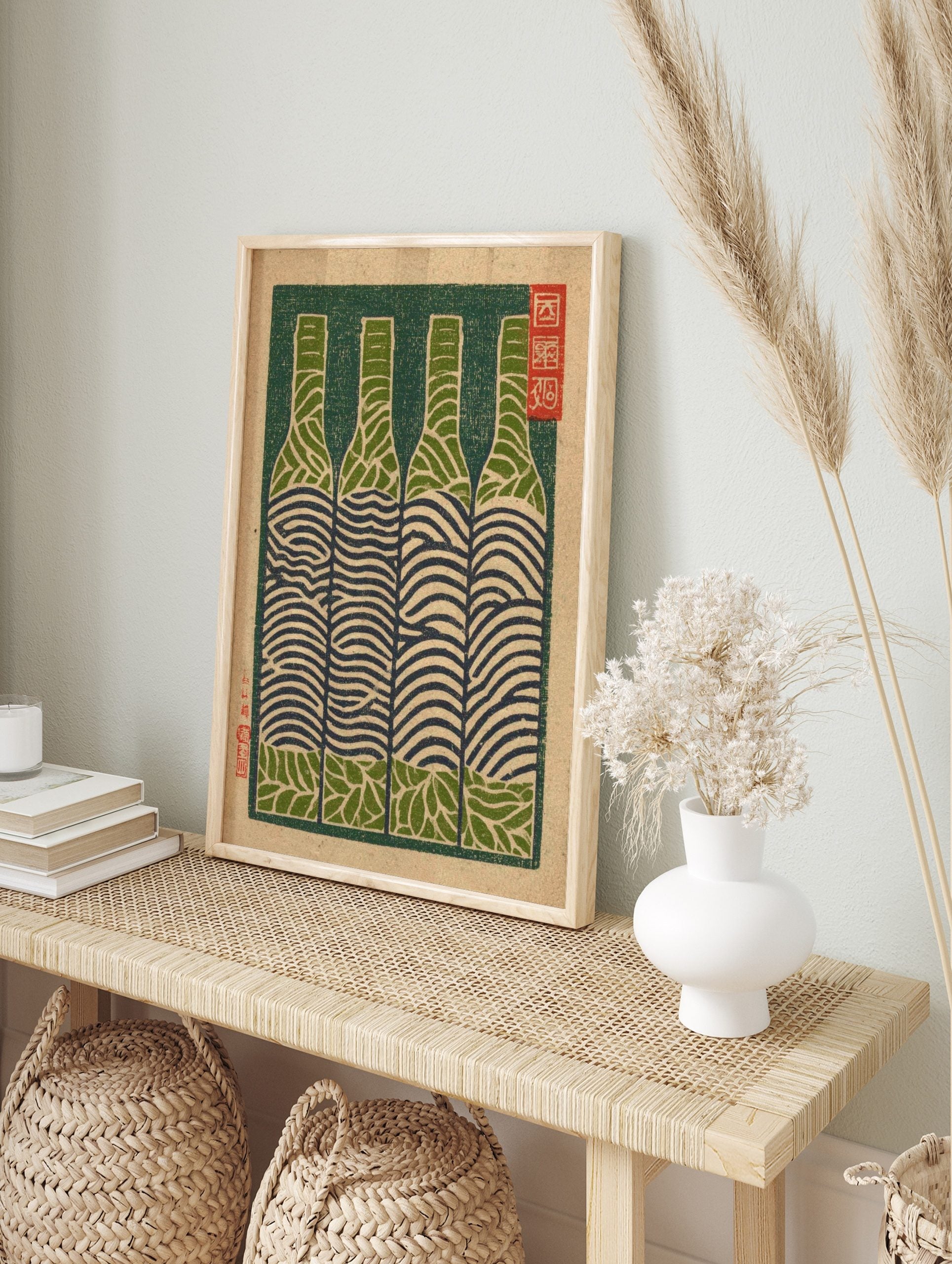 Woodblock print of four bottles with abstract green and navy wavy patterns, dark green, in an alternate framed mockup