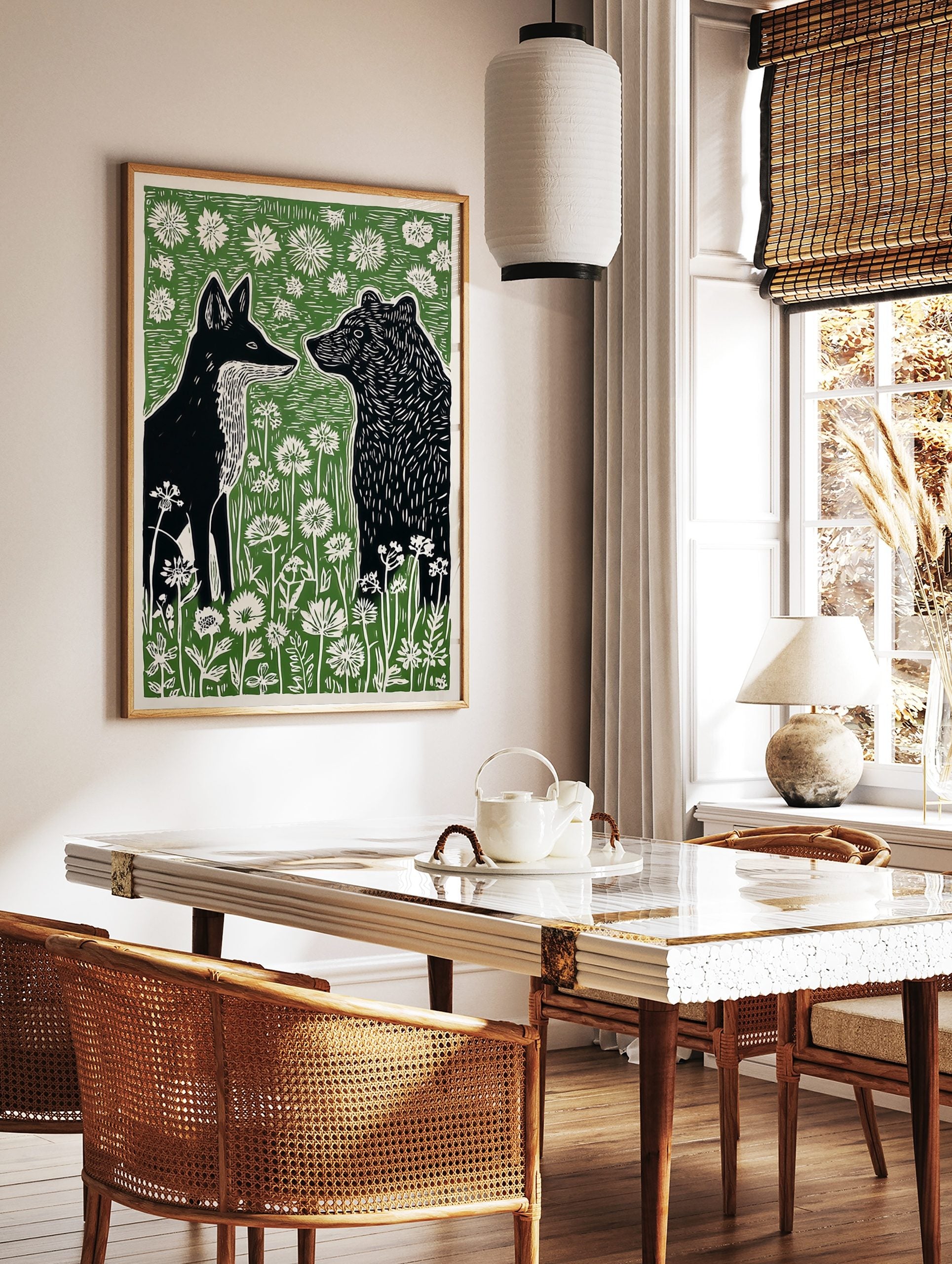 Black fox and bear in profile, surrounded by white wildflowers and green foliage, in a linocut art, in a styled room mockup