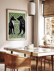 Stylised black fox and bear illustration facing each other in green and white flower field art print, in a styled room mockup