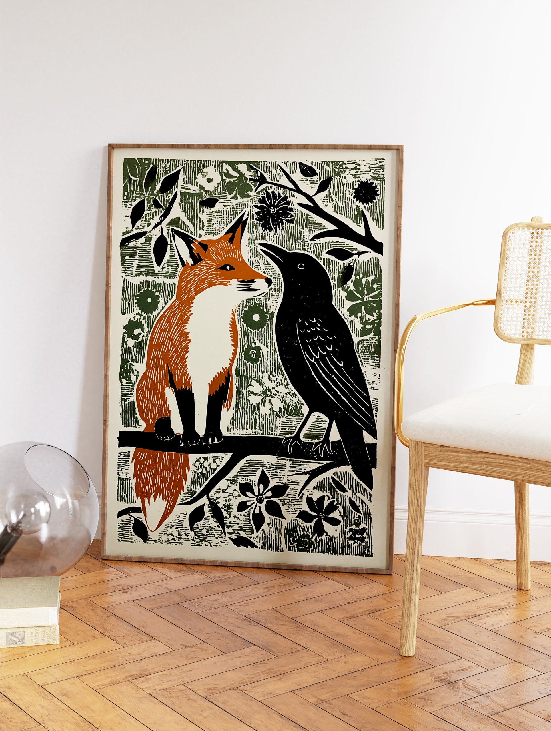Woodcut style illustration print of an orange fox and a black crow sitting on a branch amidst green foliage. - Image 2