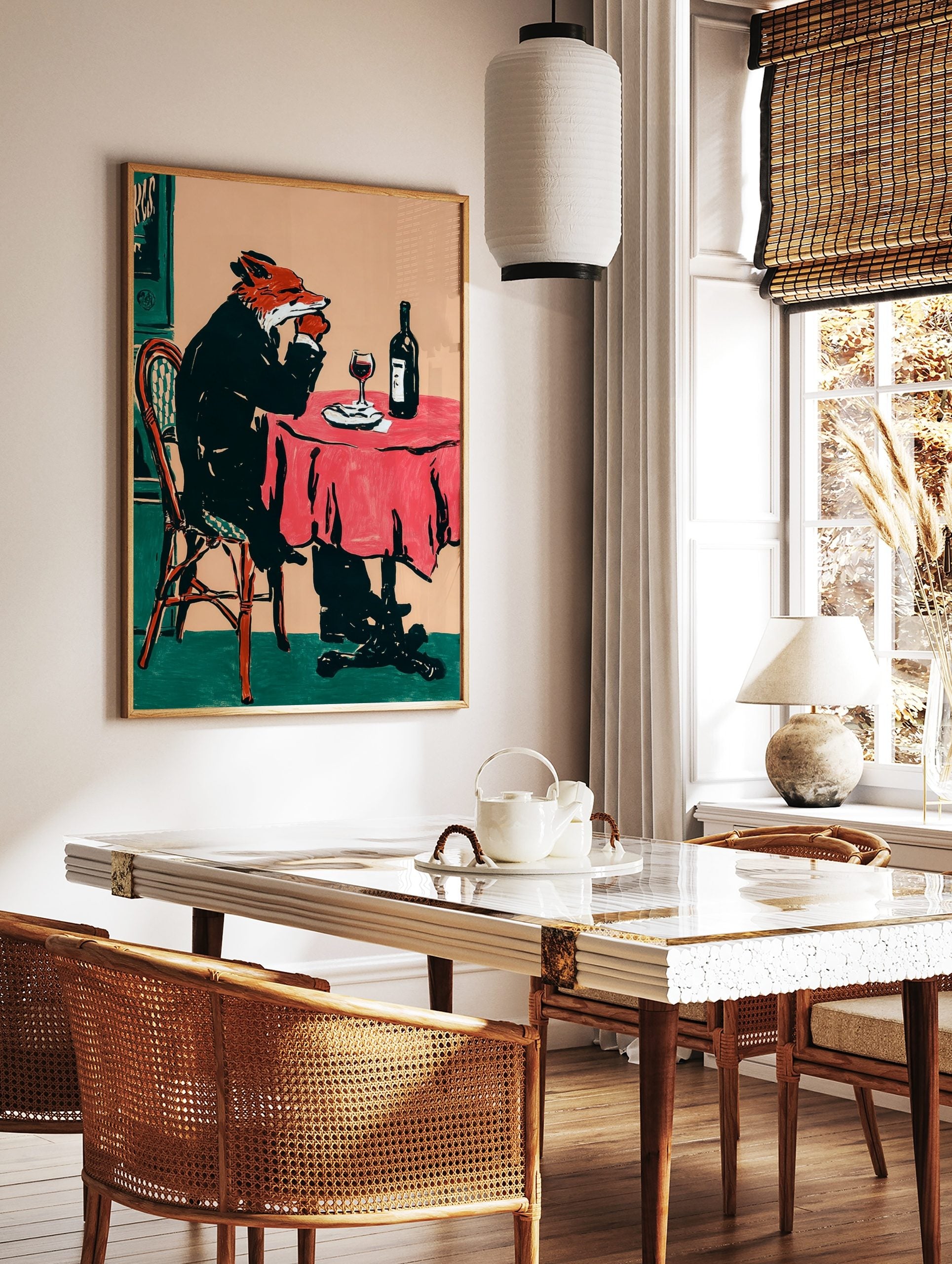 Illustrative print of a fox in a suit drinking red wine at a table with a red tablecloth, in a styled room mockup