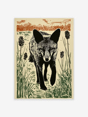 Linocut style print of a black fox walking through green reeds and brown grasses against a light background