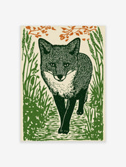 Linocut style art print of a fox walking through tall green grass with orange foliage above