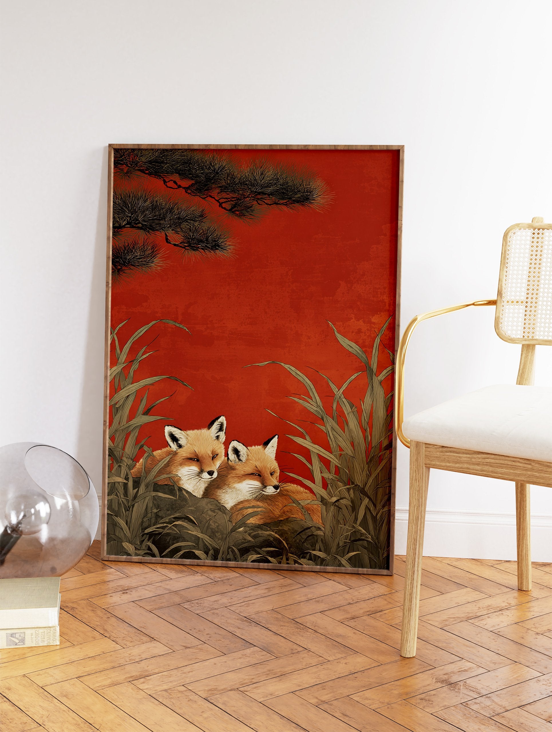 Two Japanese style foxes nestled in green foliage under pine branches against a red background, "Fox Wall Art". - Image 2