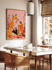Illustrative fox sitting next to a glowing lantern with colourful abstract flowers, pink and orange, in a styled room mockup