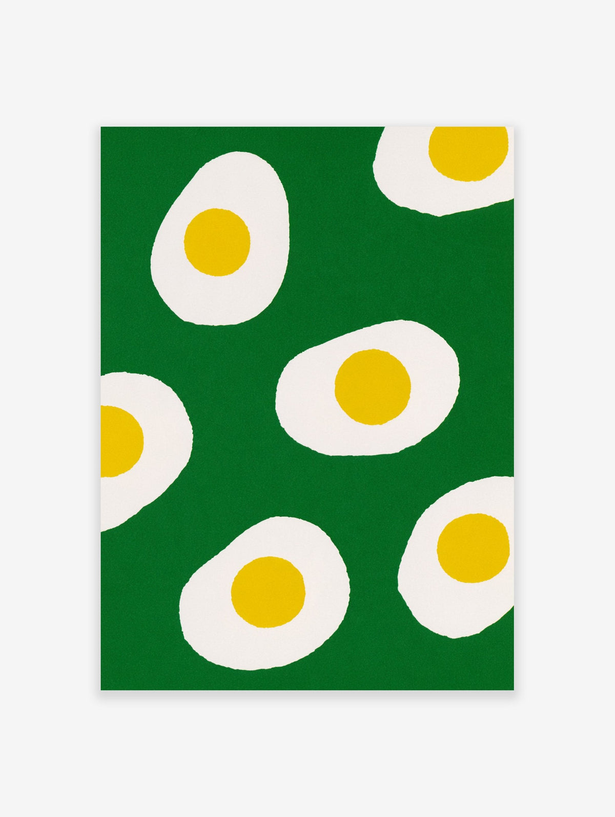 Playful fried egg print with yellow yolks and white edges on a solid green background, illustrative food wall art