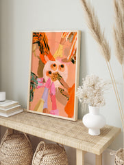 Illustrative wall art of a group of friends' legs and feet standing in a circle around a, in an alternate framed mockup
